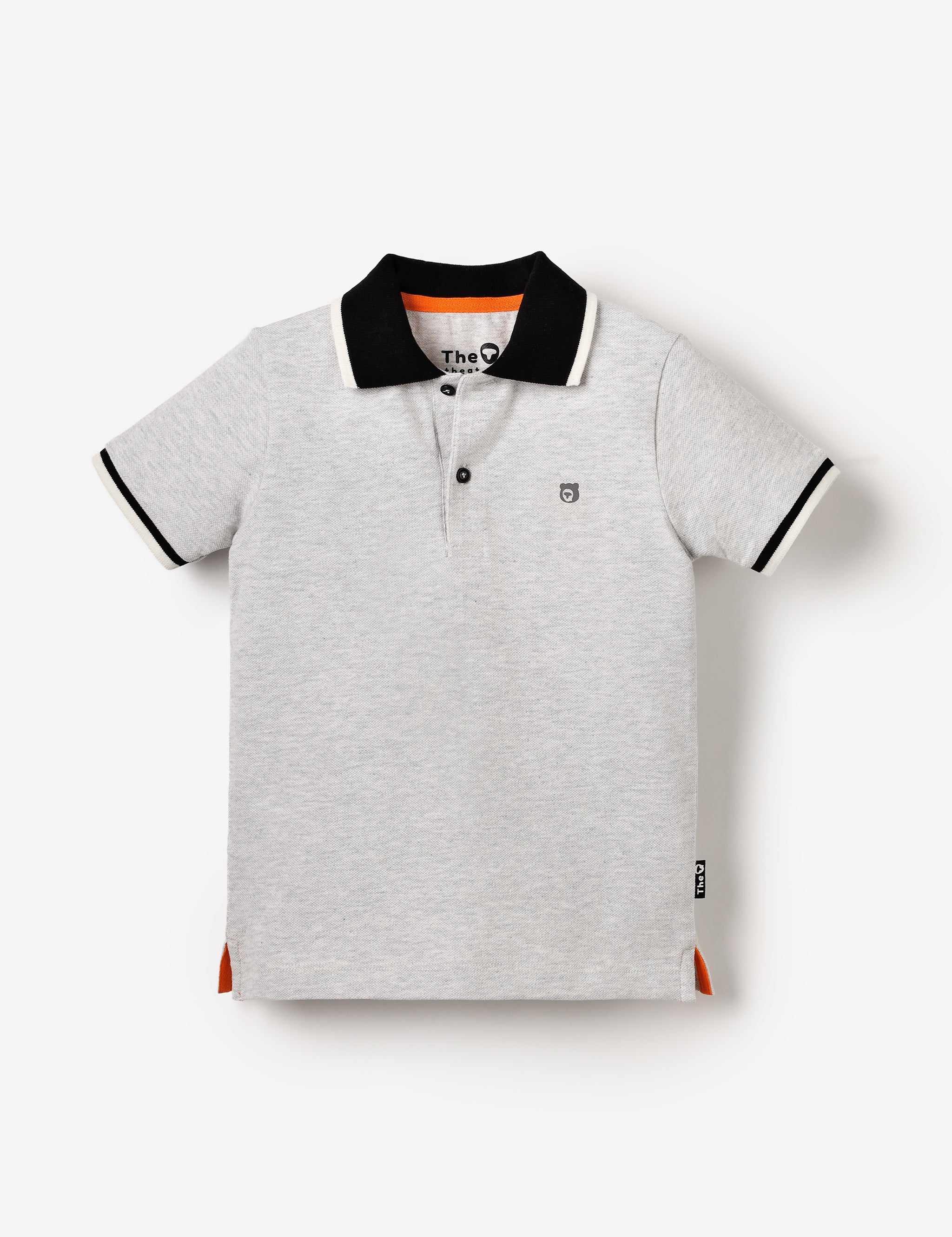 Flat lay of organic cotton kids polo top in grey marls with black and white collar and sleeve detail – unisex, plastic-free and hypoallergenic.
